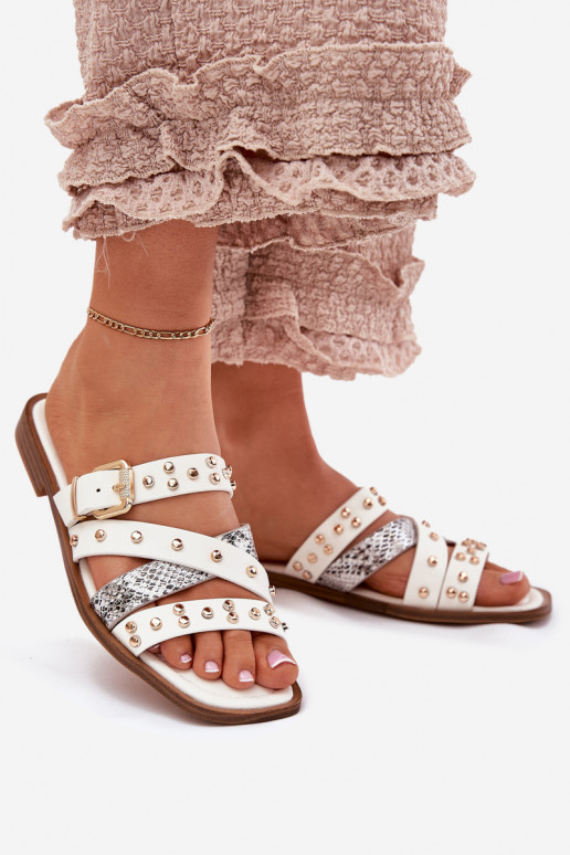 Dekorētas sieviešu čības ar platiem papēžiem Ar svītrām I ar sprādzēm baltas krāsas Tā irnitte Dekorētas sieviešu čības ar platiem papēžiem Ar svītrām I ar sprādzēm baltas krāsas Tā irnitte