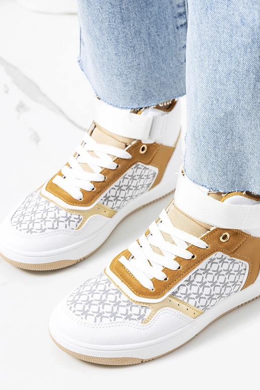 Baltas Emmers kedas ar augstu augšdaļu