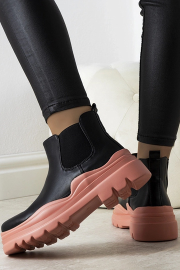 Melni zābaki uz rozā...