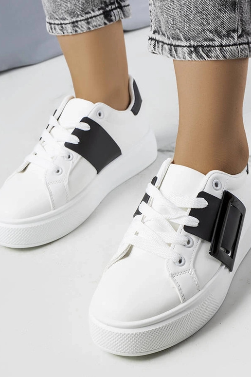 Baltas kedas rotātas ar melnu Toni...