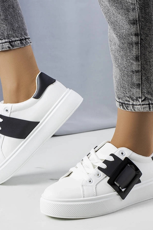 Baltas kedas rotātas ar melnu Toni...