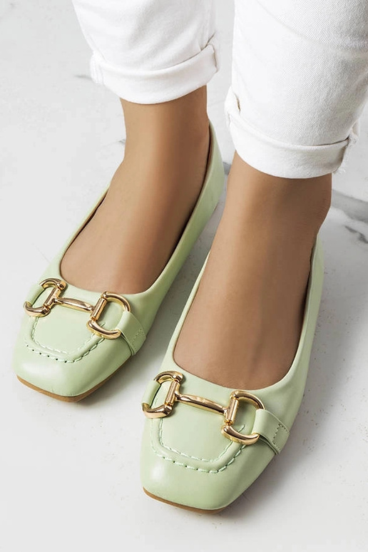 Zaļie apavi ar zelta detaļām, „Iris"