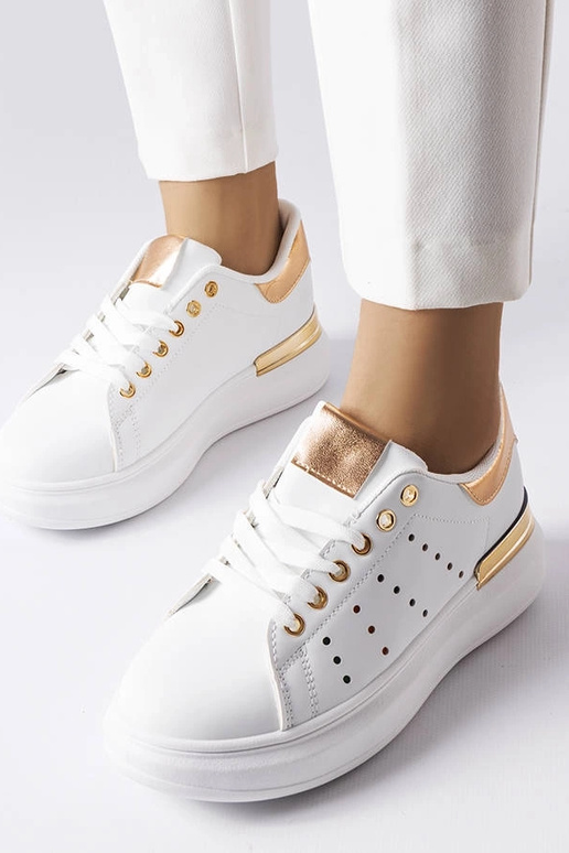 Baltas kedas ar krāsainu perforāciju...