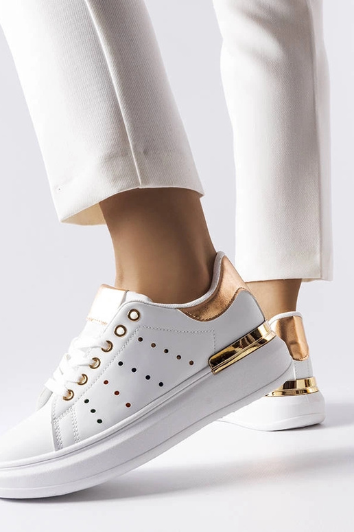 Baltas kedas ar krāsainu perforāciju...