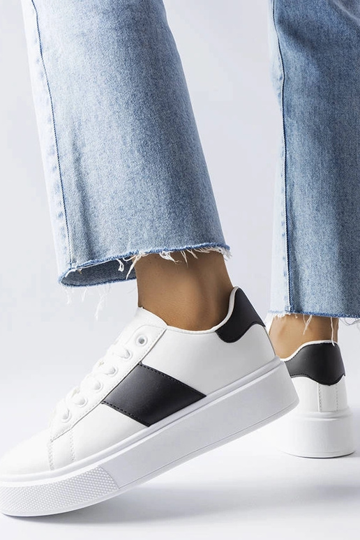 Baltas kedas ar melnu siksniņu Aurélie