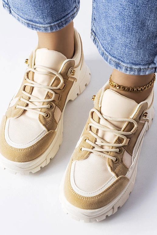 Brūni sporta apavi ar rakstainu zoli,...