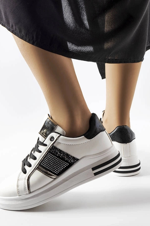 Melnbaltas kedas ar Xarles cirkoniem