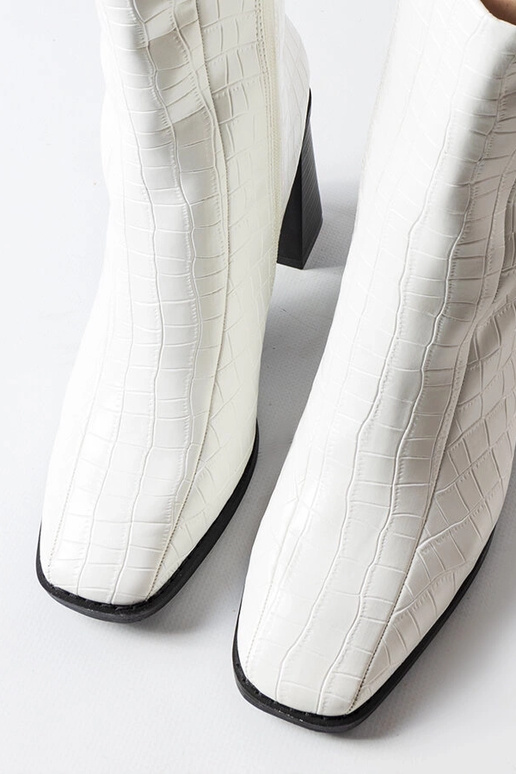 Belluci balti puszābaki ar krokodila...