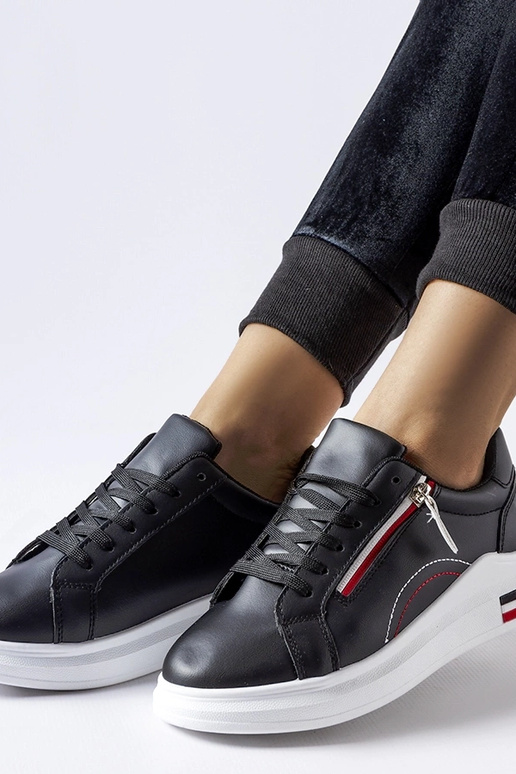 Melnas kedas ar baltu zoli Anaunia