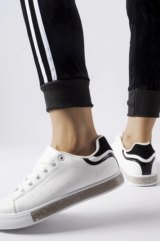 Melnbaltas Dina cirkona kedas