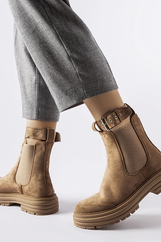 Brūni puszābaki ar dekoratīvu aizdari...