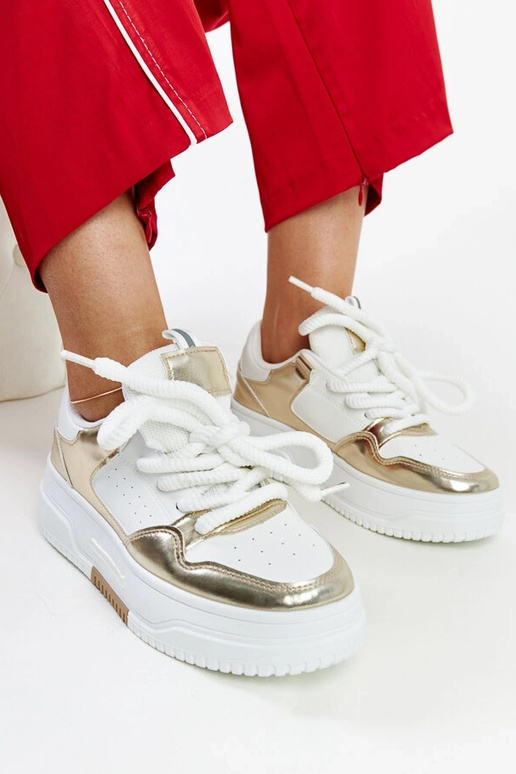 Baltas un zelta krāsas Farkas kedas...