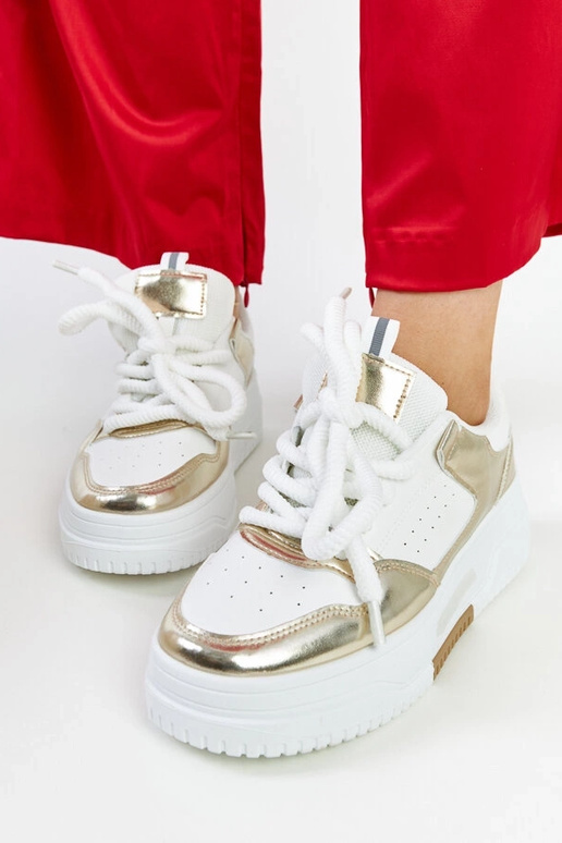 Baltas un zelta krāsas Farkas kedas...