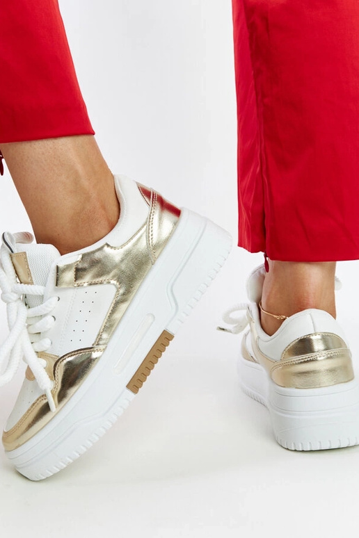 Baltas un zelta krāsas Farkas kedas...