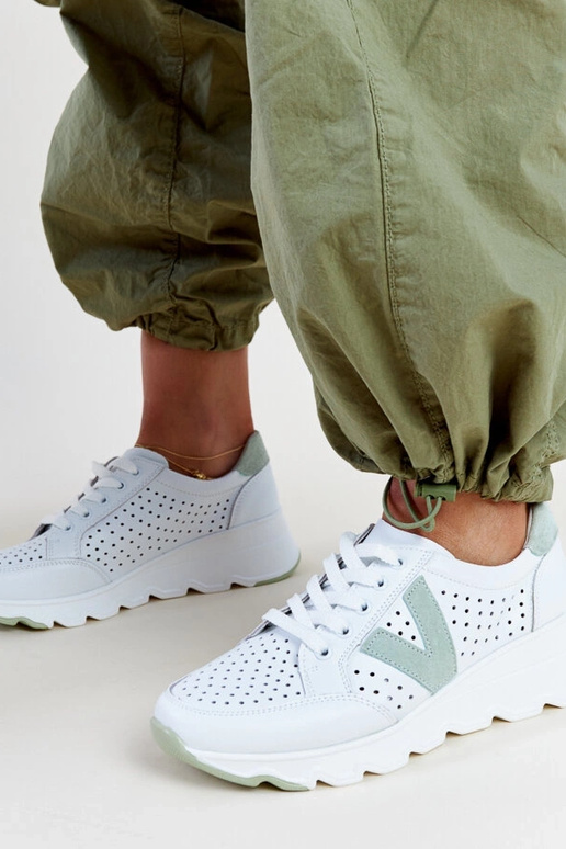 Bieli ādas caurumiņi Vinceza