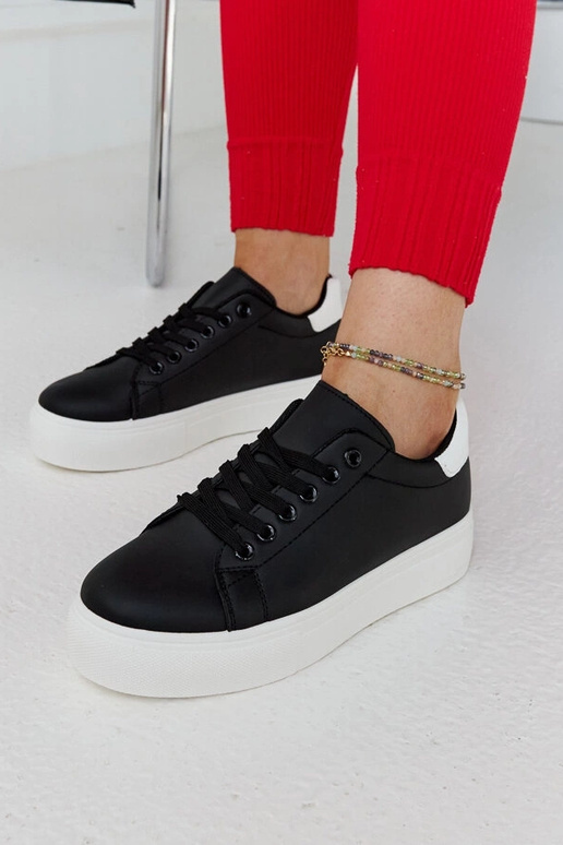 Melnbaltas kedas ar biezu zoli Ruta