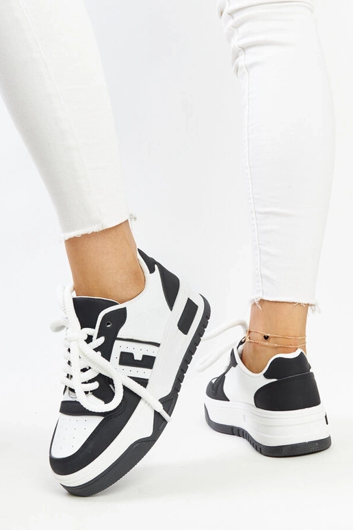 Melnbaltas kedas ar biezu zoli Galit