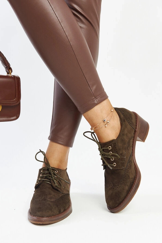 Zaļi zamšādas puszābaki ar papēžiem...