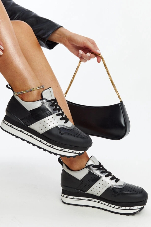 Melnas kedas ar augstu zoli Askalua