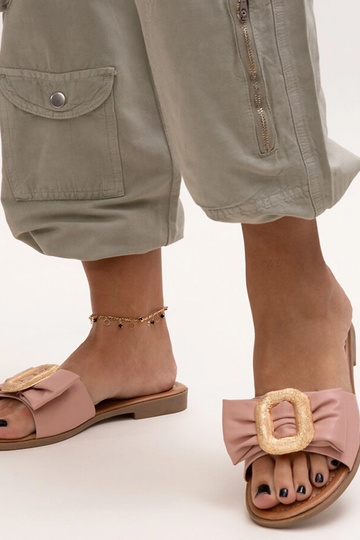 Rozā Limera sprādzes slaidi