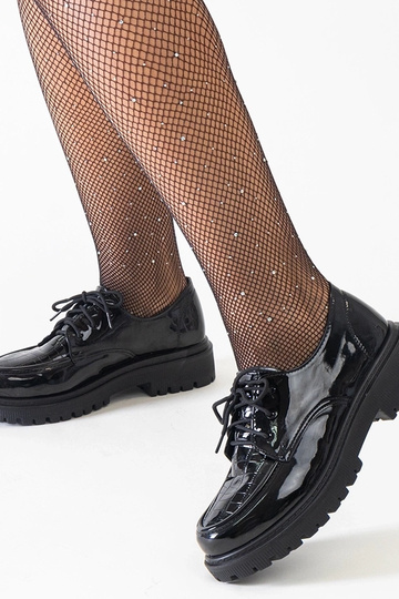 Melnas ikdienas šņorētās... 2