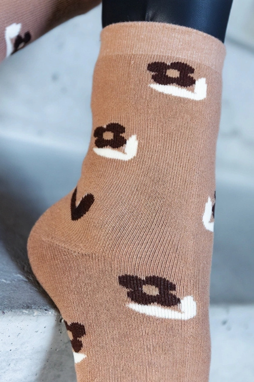 Melnbaltas siltās zeķes Sella