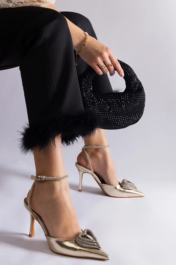 Zelta augstpapēžu kurpes ar...