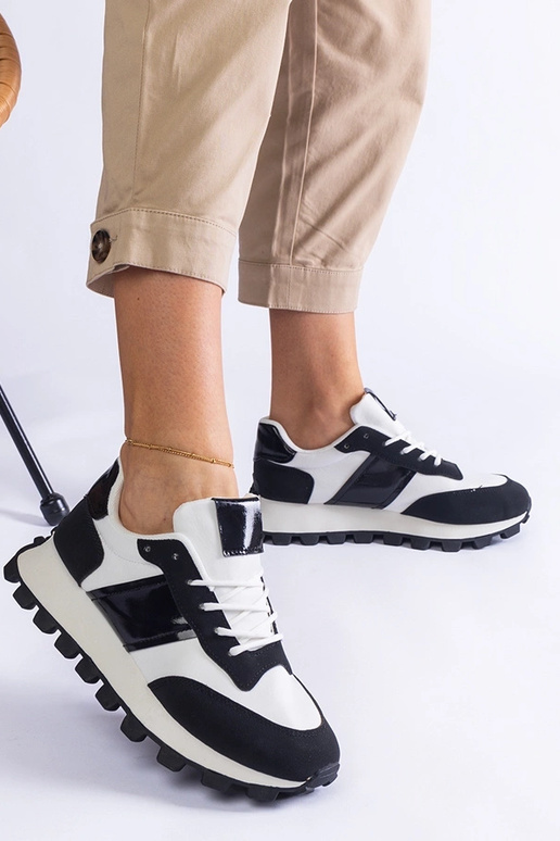 Melnas kedas ar redzamu Restia aizsargu