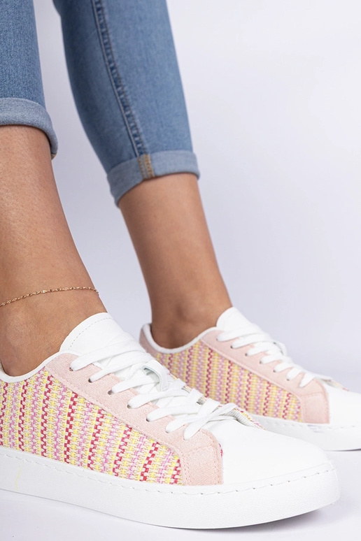 Rozā sieviešu auduma sporta apavi... Rozā sieviešu auduma sporta apavi...