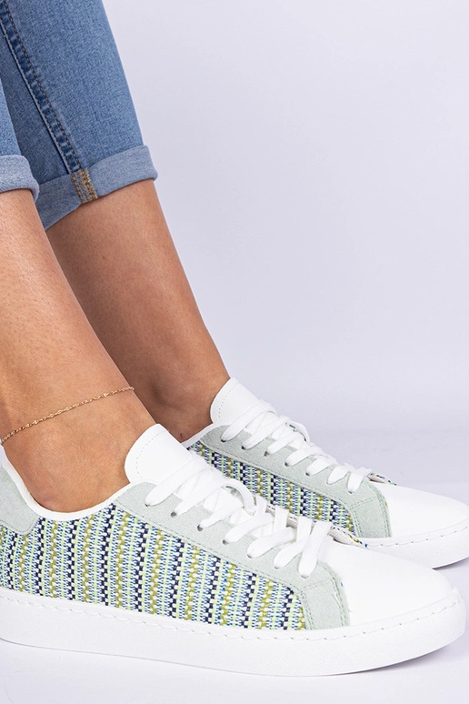 Zaļie sieviešu auduma sporta apavi... Zaļie sieviešu auduma sporta apavi...