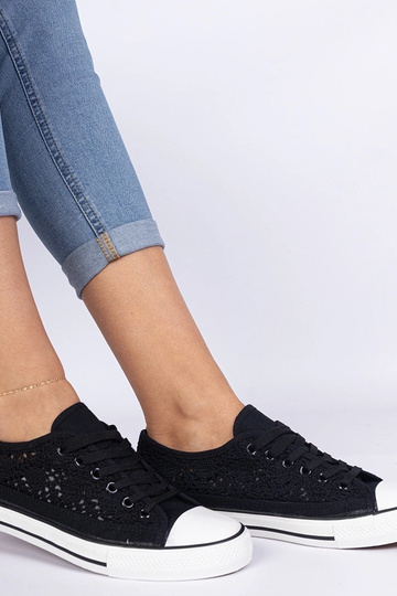 Melni sieviešu caurumiņapavi