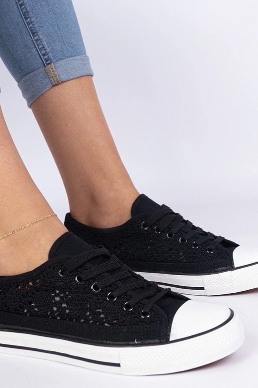 Melni sieviešu caurumiņapavi