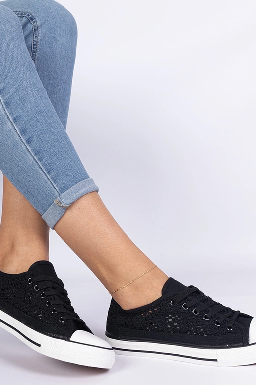 Melni sieviešu caurumiņapavi