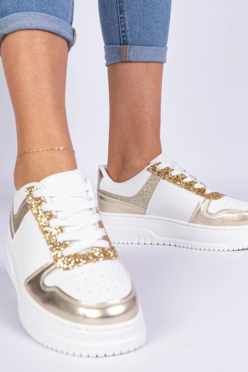 Zelta sieviešu sneakers ar biezu zoli