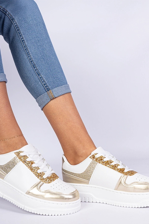 Zelta sieviešu sneakers ar biezu zoli Zelta sieviešu sneakers ar biezu zoli
