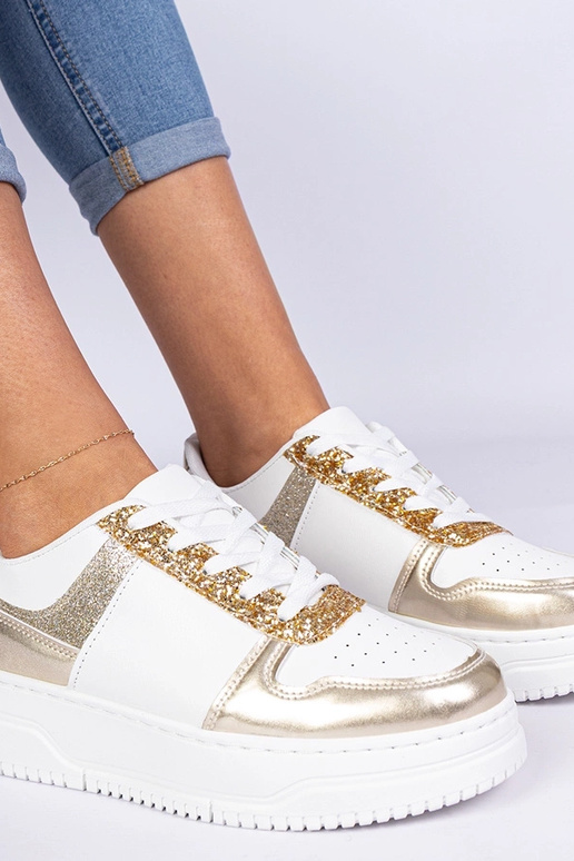 Zelta sieviešu sneakers ar biezu zoli Zelta sieviešu sneakers ar biezu zoli