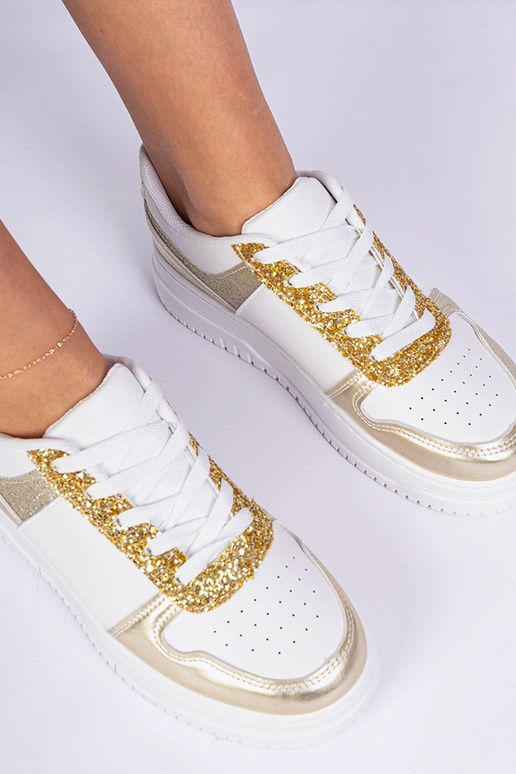 Zelta sieviešu sneakers ar biezu zoli Zelta sieviešu sneakers ar biezu zoli