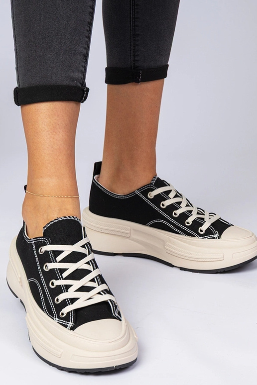 Melni sieviešu auduma sporta apavi...