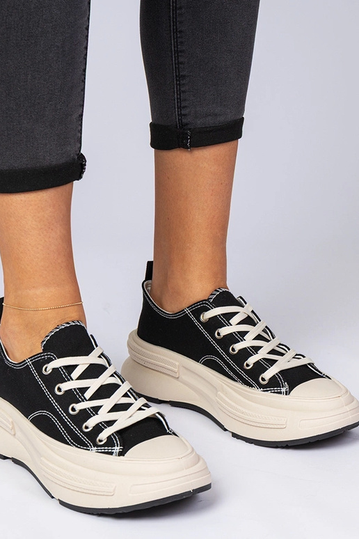 Melni sieviešu auduma sporta apavi...