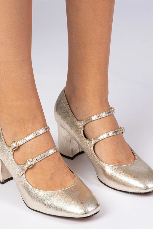 Zelta sieviešu kurpes uz staba ar...