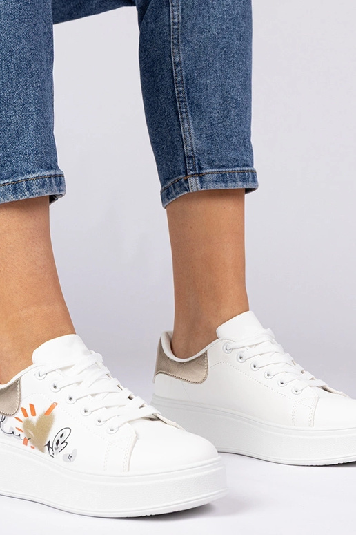 Baltā un zelta sporta apavi sievietēm... Baltā un zelta sporta apavi sievietēm...