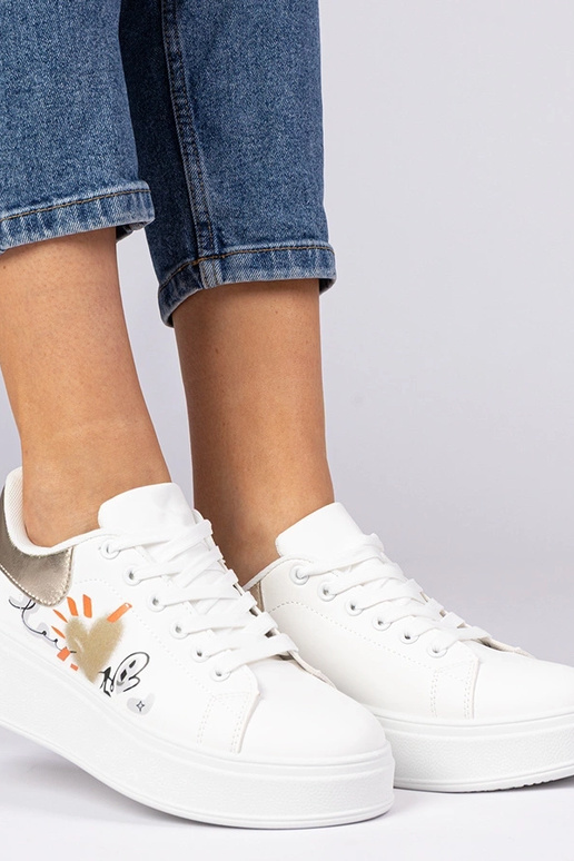 Baltā un zelta sporta apavi sievietēm... Baltā un zelta sporta apavi sievietēm...