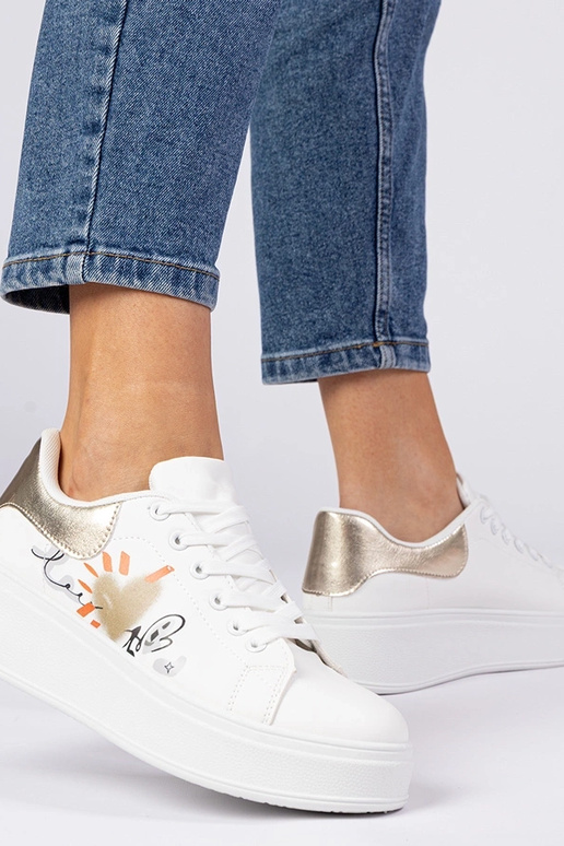 Baltā un zelta sporta apavi sievietēm... Baltā un zelta sporta apavi sievietēm...