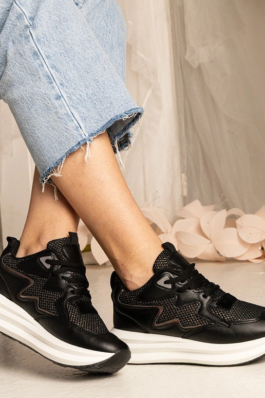 Melnas kedas ar hologrāfisku elementu...