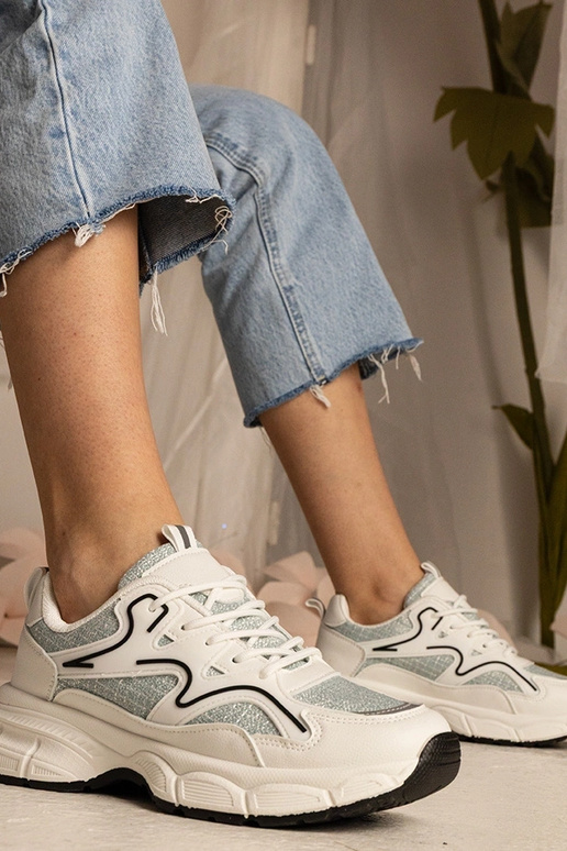 Balti un zaļi sporta apavi sievietēm...