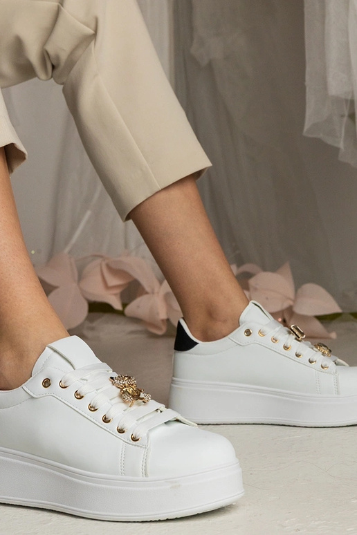 Baltmelni sporta apavi sievietēm ar... Baltmelni sporta apavi sievietēm ar...