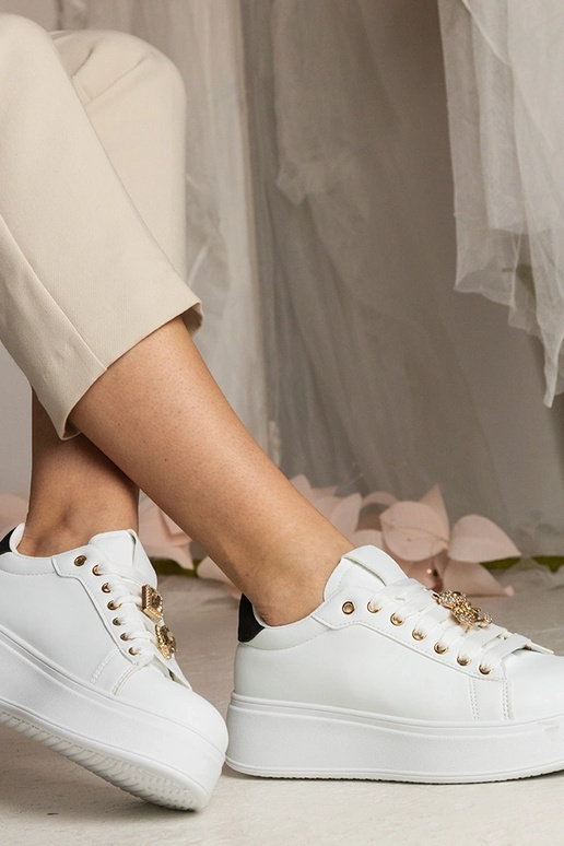 Baltmelni sporta apavi sievietēm ar... Baltmelni sporta apavi sievietēm ar...