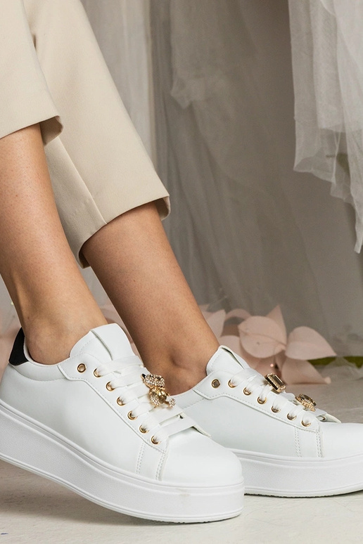 Baltmelni sporta apavi sievietēm ar... Baltmelni sporta apavi sievietēm ar...