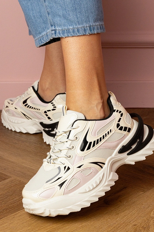 Smilšu krāsas sieviešu sporta apavi...