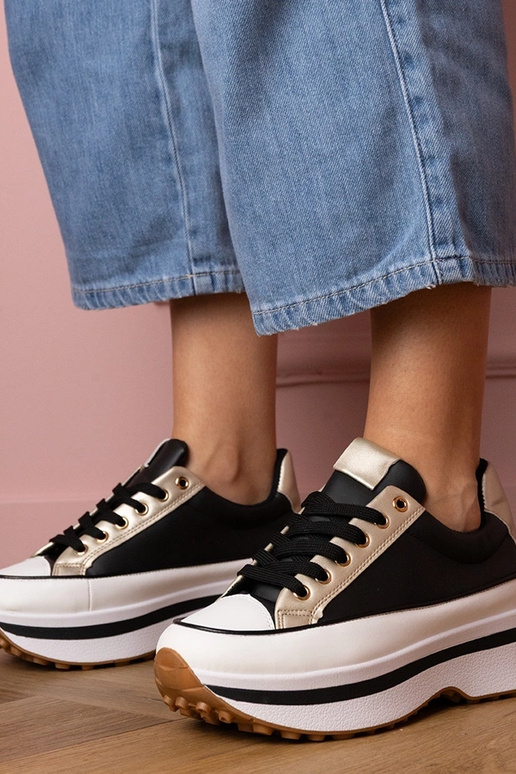 Melnas sieviešu sporta kurpes uz...